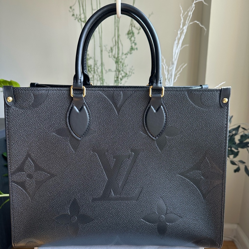 NWT OnTheGo MM Tote bag, black on black. Never used and in pristine condition